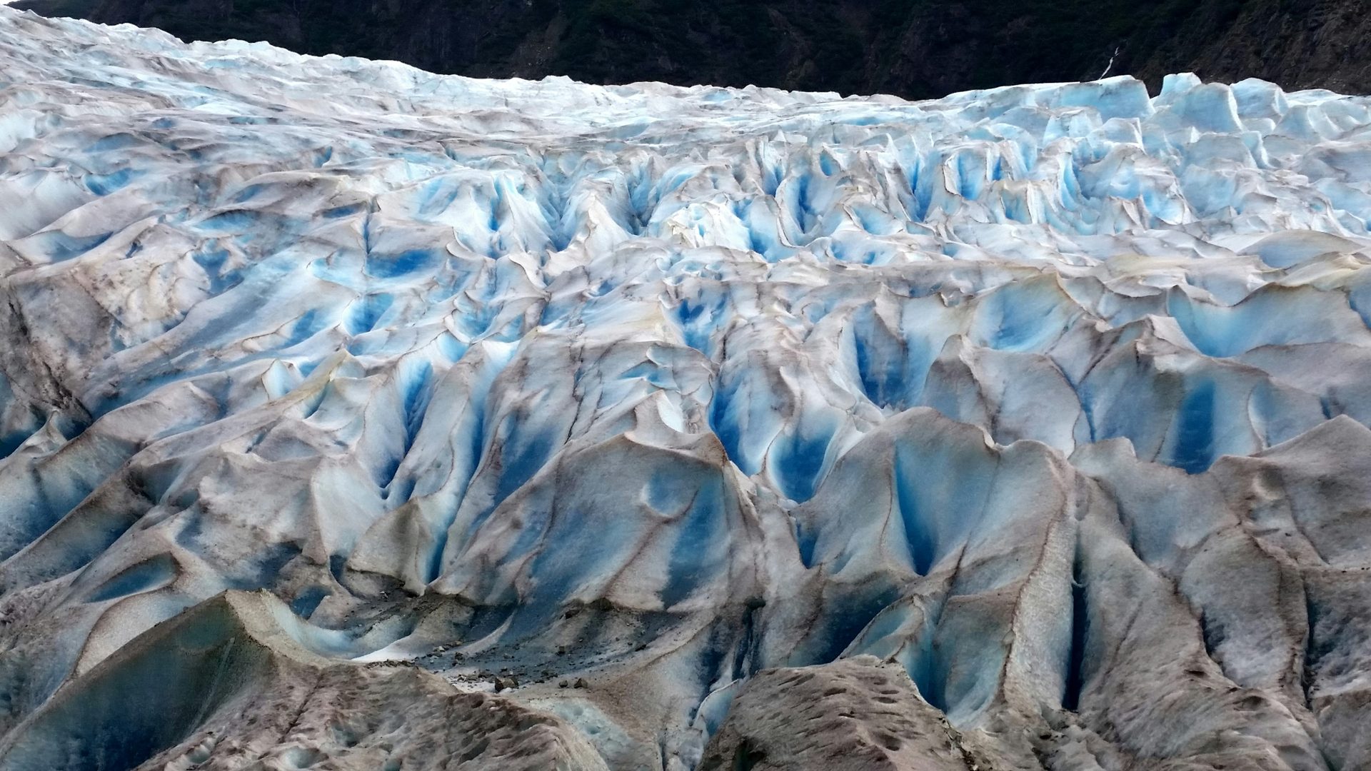 Close-up of the blue, ridged ice of the Mendenhall Glacier near Juneau