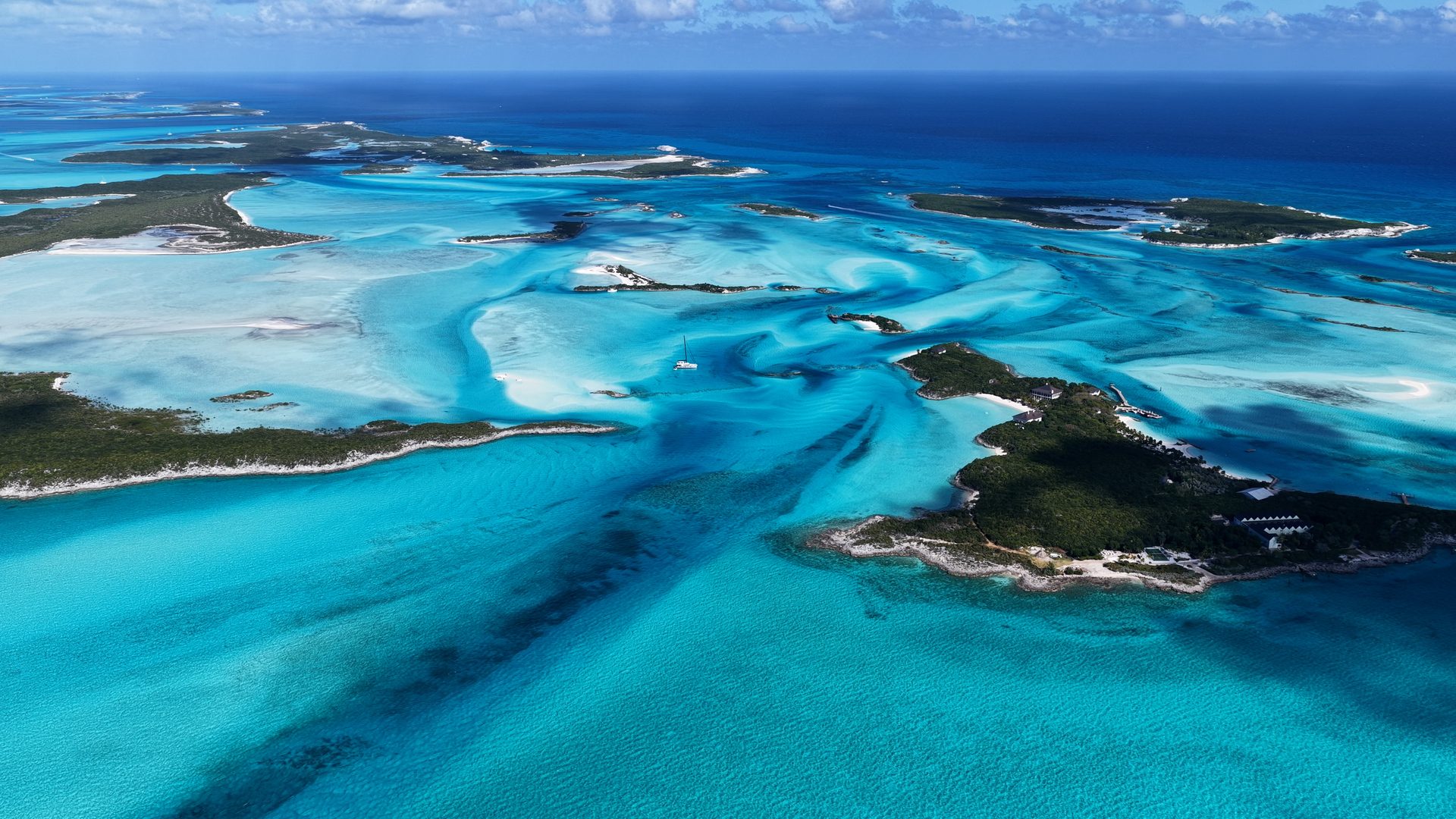 Turquoise sandbars and channels winding between the Exuma Cays