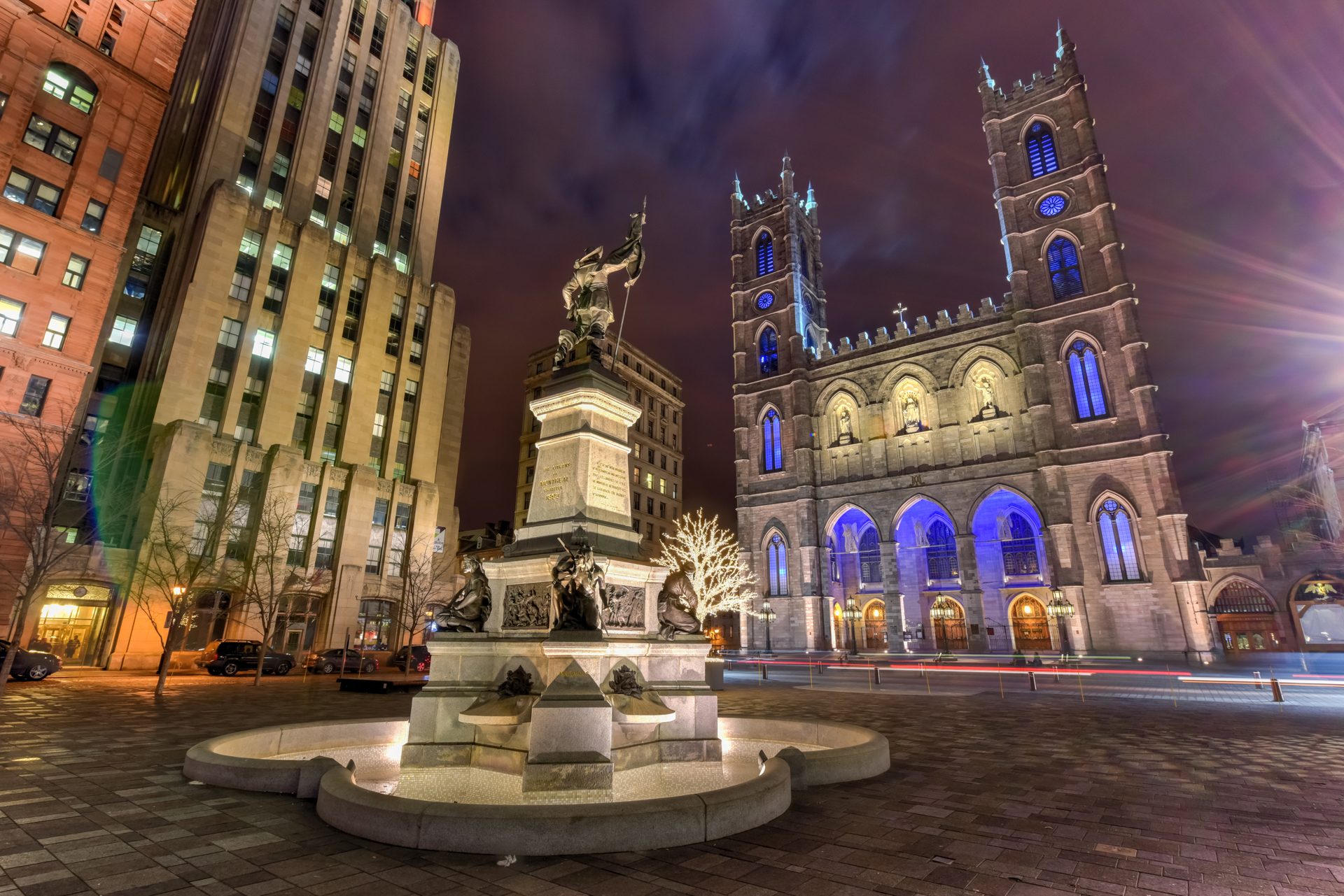Notre-Dame Basilica and Place d'Armes in Old Montréal at night